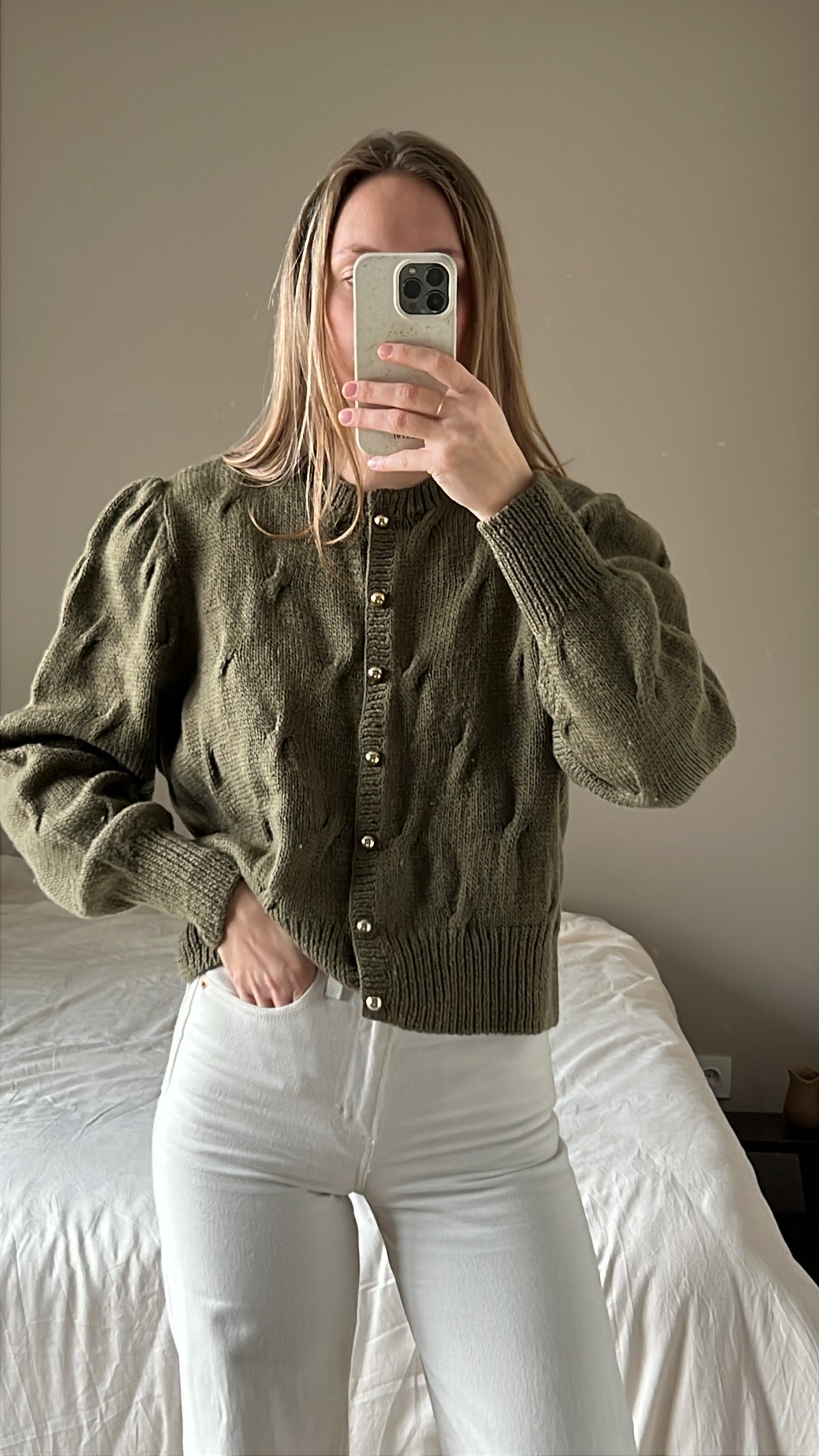 Green woolen cardigan